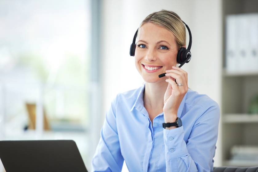 Call Centre Agent Using Her Laptop in the Office