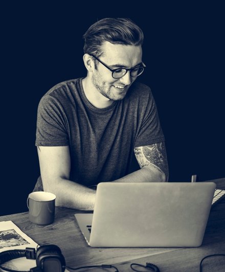 Man busy working and editing in the office